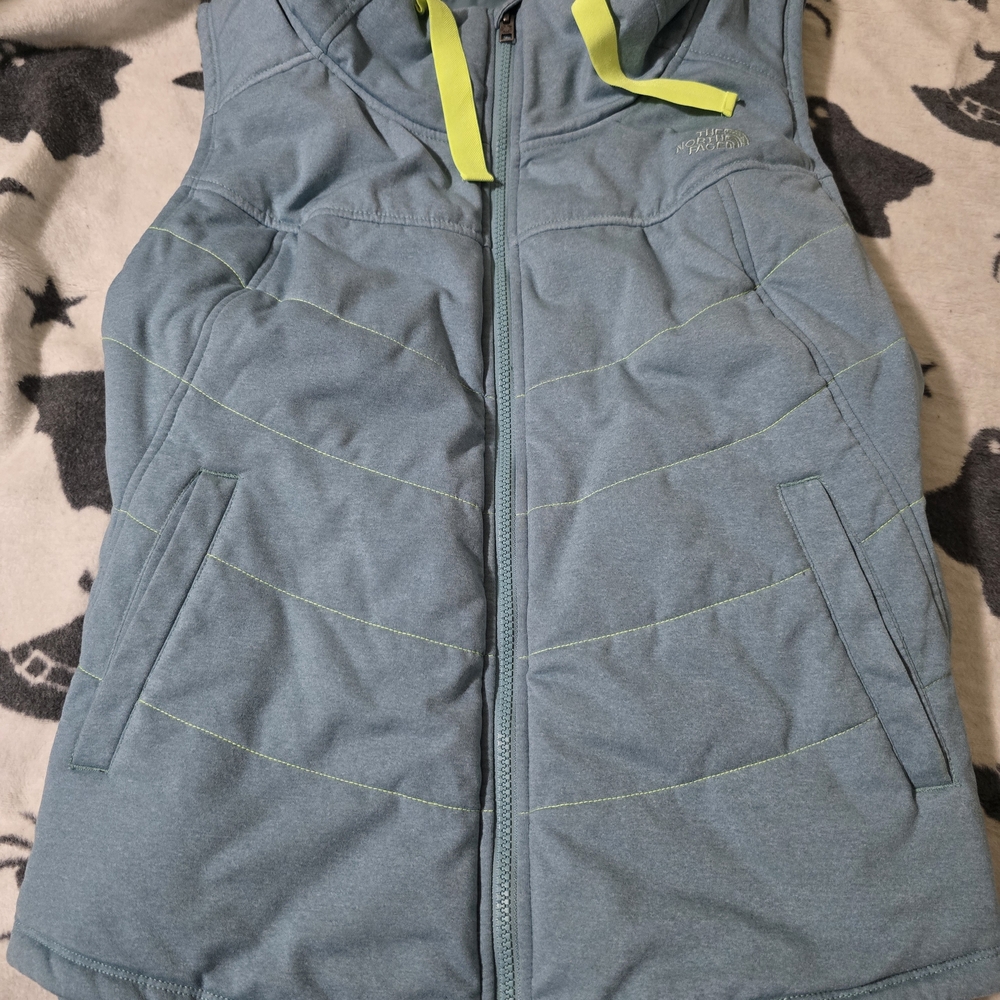 The North Face Blue Vest with Yellow Accents